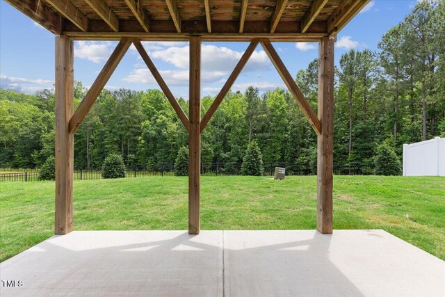 260 Amber Acorn Ave, Raleigh, NC 27603 - view of patio / terrace featuring a forest view