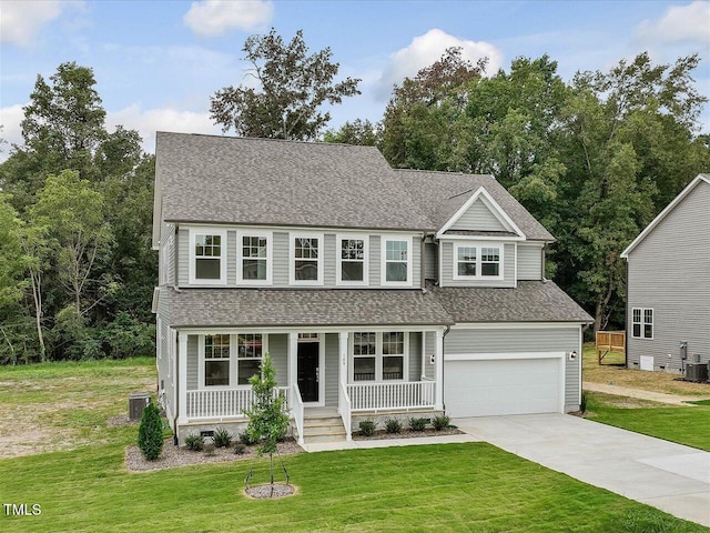 traditional-style house with a porch, a front lawn, a shingled roof, concrete driveway, and an attached garage