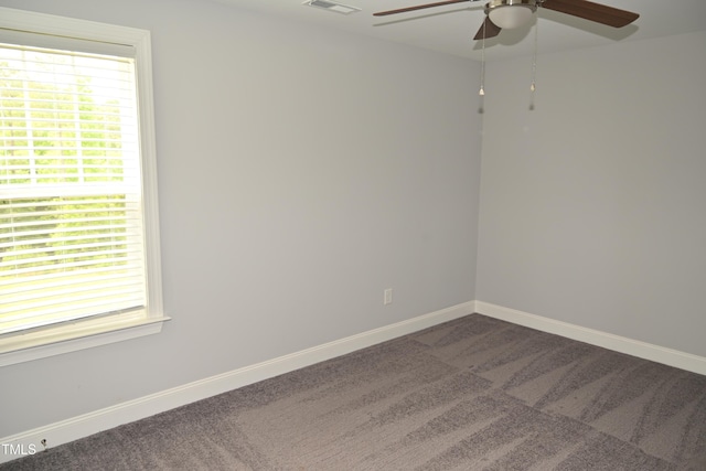 474 Ashpole Trl, Clayton, NC 27520 - unfurnished room featuring a ceiling fan, dark colored carpet, and baseboards