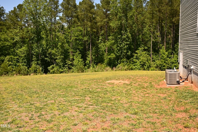 474 Ashpole Trl, Clayton, NC 27520 - view of green lawn featuring central AC