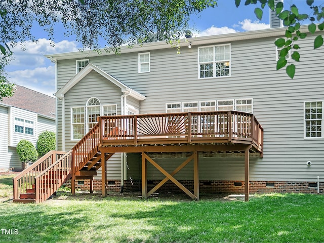back of house featuring stairway, a yard, a deck, and crawl space