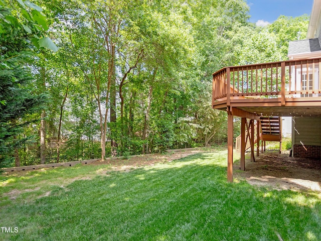 view of yard with stairway and a wooden deck