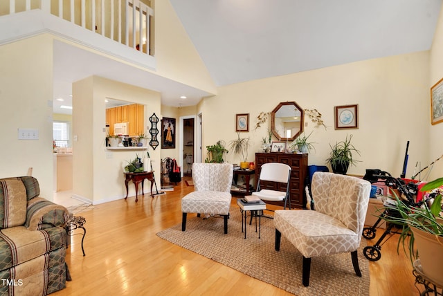 17 Nicklaus Way, Clayton, NC 27520 - interior space featuring high vaulted ceiling, baseboards, and light wood-style flooring