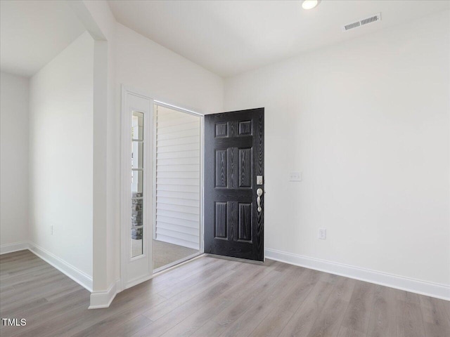 33 Celtic Ln, Lillington, NC 27546 - entryway featuring baseboards, visible vents, wood finished floors, and recessed lighting