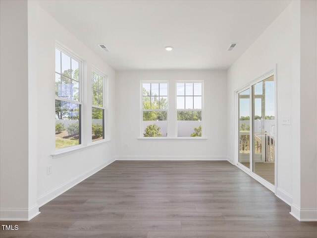 33 Celtic Ln, Lillington, NC 27546 - empty room with recessed lighting, visible vents, wood finished floors, and baseboards