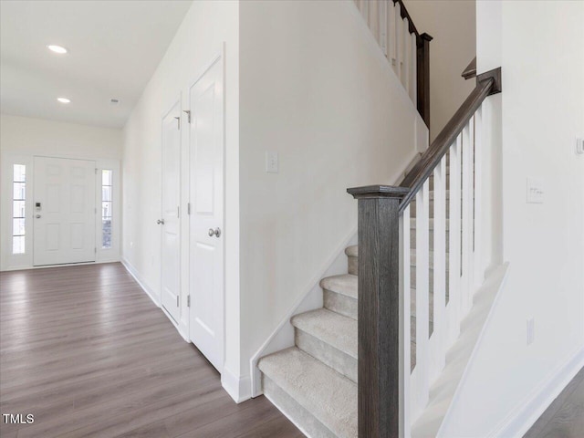 33 Celtic Ln, Lillington, NC 27546 - entrance foyer featuring baseboards, stairway, wood finished floors, and recessed lighting