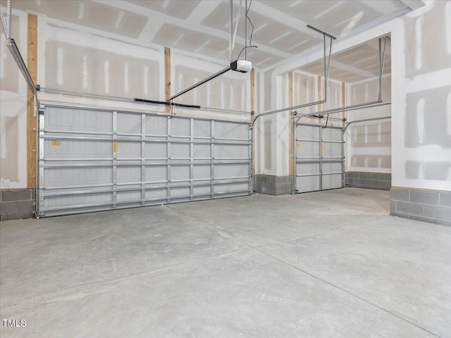 33 Celtic Ln, Lillington, NC 27546 - garage featuring a garage door opener