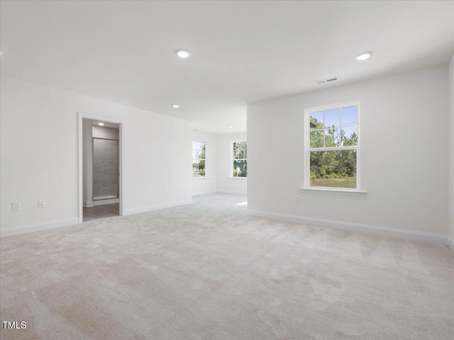 33 Celtic Ln, Lillington, NC 27546 - spare room with carpet, visible vents, recessed lighting, and baseboards