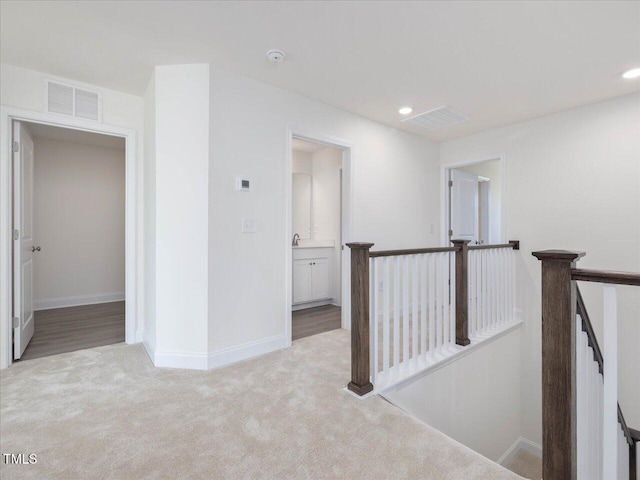 33 Celtic Ln, Lillington, NC 27546 - unfurnished room with baseboards, visible vents, and light colored carpet