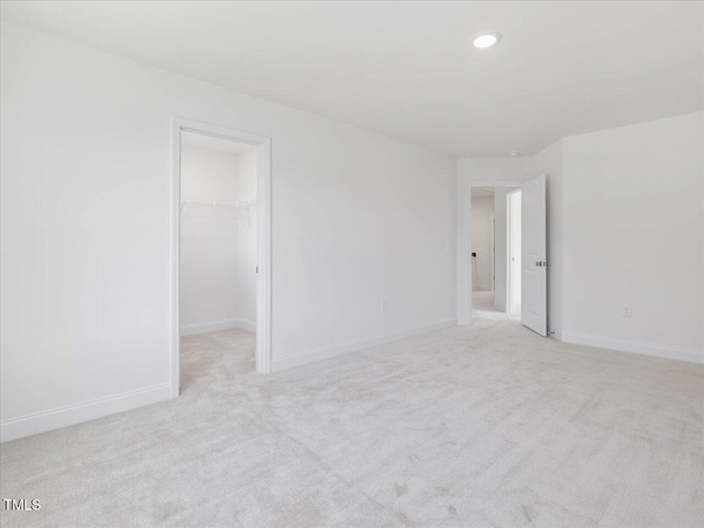 33 Celtic Ln, Lillington, NC 27546 - spare room featuring recessed lighting, light carpet, and baseboards