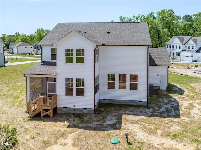 33 Celtic Ln, Lillington, NC 27546 - rear view of property featuring roof with shingles, central AC unit, crawl space, and a sunroom