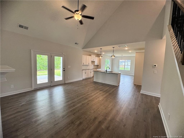 374 Whitestone Dr, Fayetteville, NC 28312 - unfurnished living room with dark wood-style floors, a ceiling fan, and high vaulted ceiling