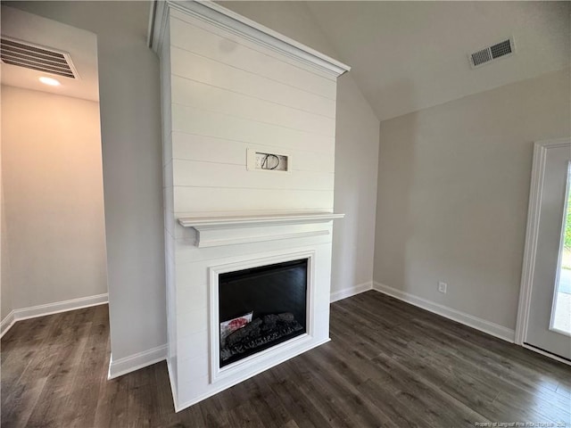 374 Whitestone Dr, Fayetteville, NC 28312 - unfurnished living room with dark wood-type flooring, a large fireplace, and lofted ceiling