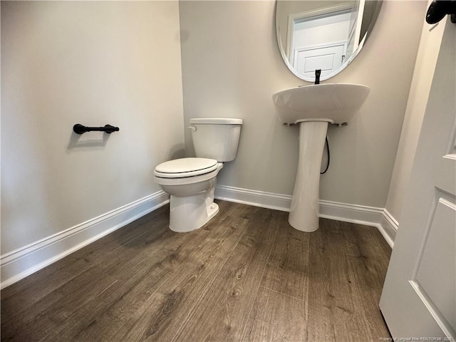 374 Whitestone Dr, Fayetteville, NC 28312 - bathroom featuring baseboards and wood finished floors