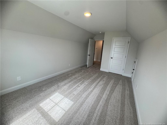 374 Whitestone Dr, Fayetteville, NC 28312 - additional living space with carpet floors and vaulted ceiling