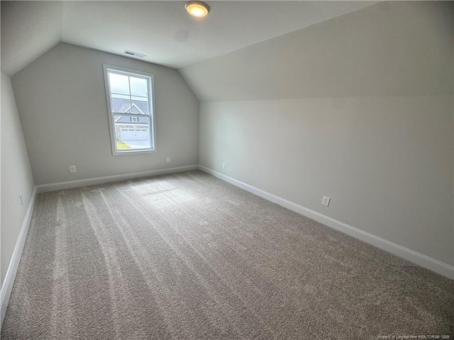 374 Whitestone Dr, Fayetteville, NC 28312 - additional living space with carpet and lofted ceiling