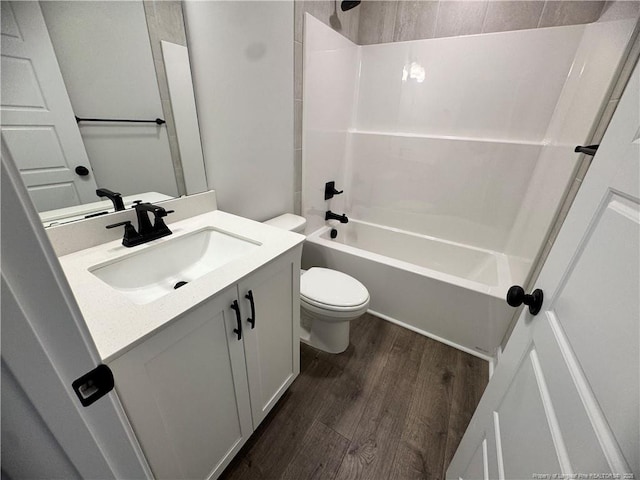 374 Whitestone Dr, Fayetteville, NC 28312 - full bathroom with wood finished floors, vanity, and bathtub / shower combination