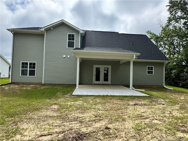 374 Whitestone Dr, Fayetteville, NC 28312 - rear view of property featuring a patio area, a yard, and roof with shingles