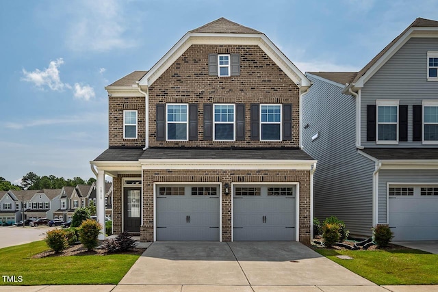 1018 Excite Ave, Morrisville, NC 27560 - view of front of house featuring an attached garage, brick siding, and driveway
