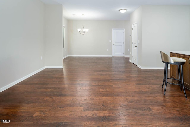 1018 Excite Ave, Morrisville, NC 27560 - unfurnished dining area featuring a chandelier and dark wood finished floors