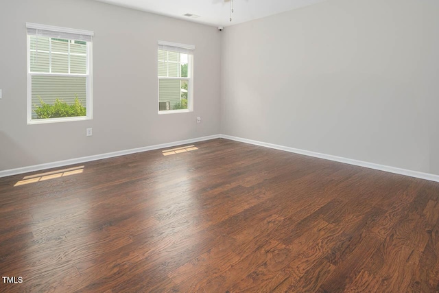 1018 Excite Ave, Morrisville, NC 27560 - empty room featuring dark wood-style flooring and a ceiling fan