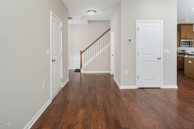 1018 Excite Ave, Morrisville, NC 27560 - hall with dark wood-style flooring and stairs