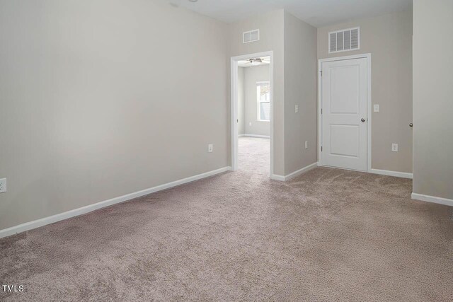 1018 Excite Ave, Morrisville, NC 27560 - carpeted spare room featuring baseboards and ceiling fan