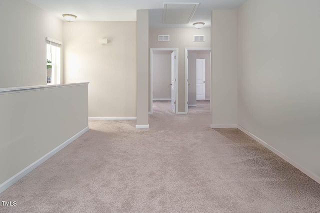 1018 Excite Ave, Morrisville, NC 27560 - unfurnished room featuring attic access and light carpet