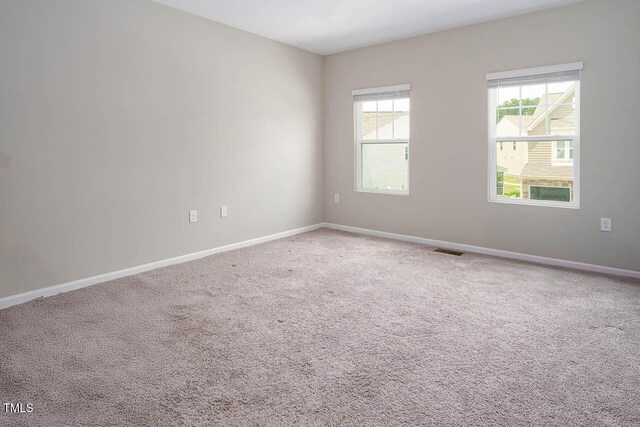 1018 Excite Ave, Morrisville, NC 27560 - empty room with baseboards and carpet floors