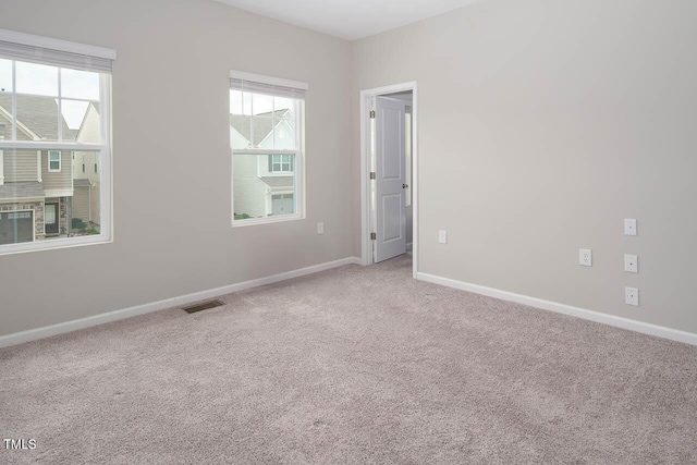1018 Excite Ave, Morrisville, NC 27560 - spare room with carpet and baseboards