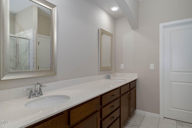 1018 Excite Ave, Morrisville, NC 27560 - bathroom with double vanity, a stall shower, and marble look tile flooring