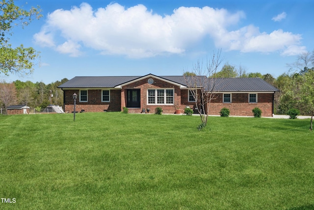 3540 Sellars Rd, Mebane, NC 27302 - single story home with metal roof, brick siding, and a front lawn