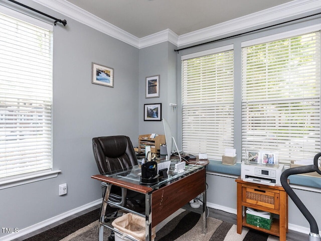 office space with baseboards, ornamental molding, and wood finished floors