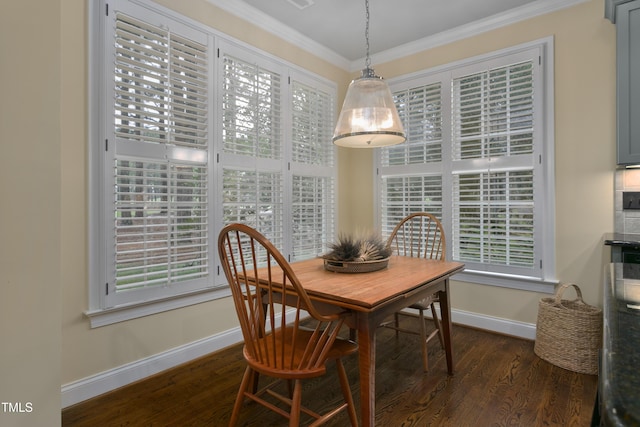 dining space with crown molding, baseboards, and dark wood-type flooring