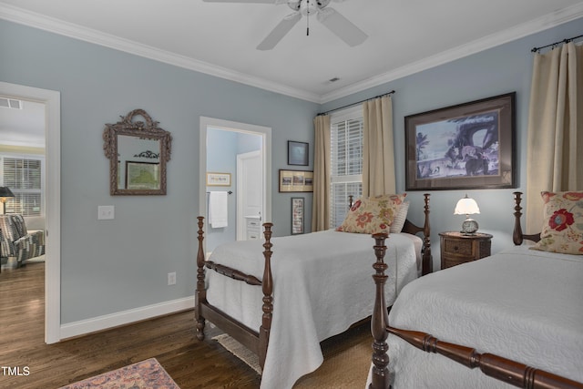 bedroom with crown molding, baseboards, ceiling fan, and dark wood-type flooring
