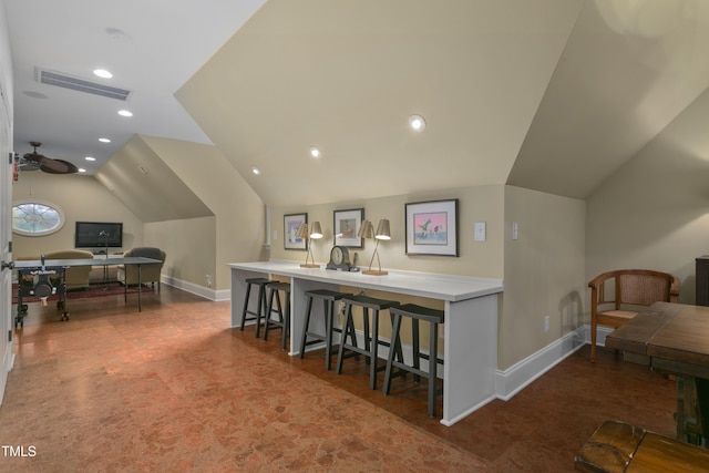 home office featuring visible vents, recessed lighting, baseboards, and lofted ceiling