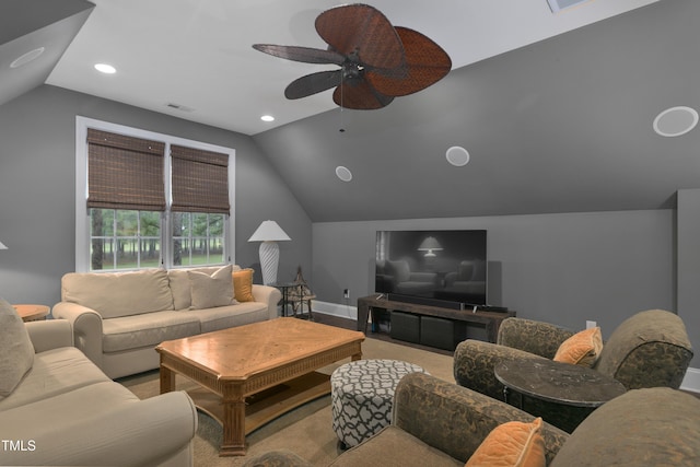 living room featuring baseboards, a ceiling fan, vaulted ceiling, and visible vents