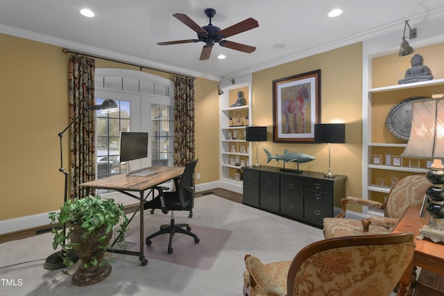 office featuring ornamental molding, baseboards, ceiling fan, recessed lighting, and built in shelves