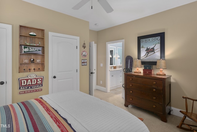 bedroom with baseboards, ceiling fan, connected bathroom, and light colored carpet