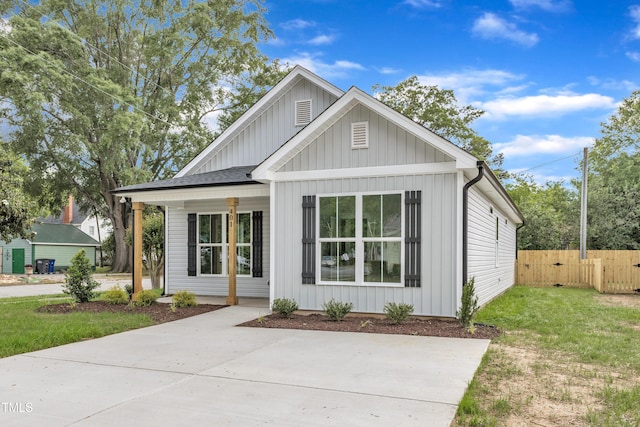 401 N Raiford St, Selma, NC 27576 - modern farmhouse style home with board and batten siding and covered porch