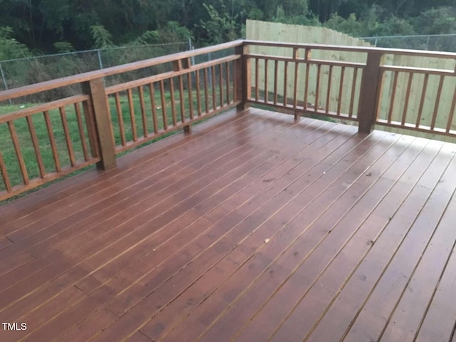 deck featuring a view of trees