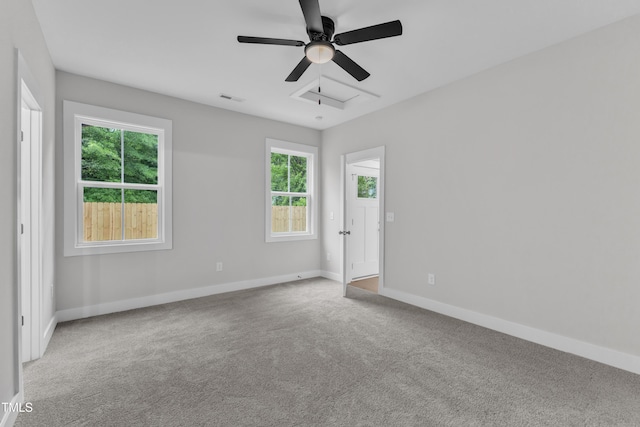 405 N Raiford St, Selma, NC 27576 - carpeted empty room featuring baseboards and a ceiling fan