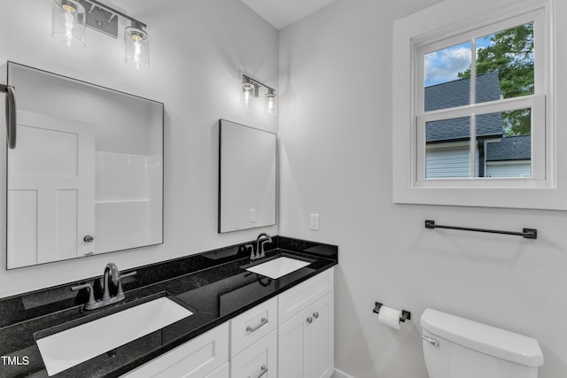 405 N Raiford St, Selma, NC 27576 - bathroom with toilet and double vanity