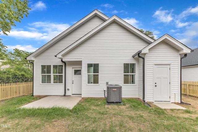 405 N Raiford St, Selma, NC 27576 - rear view of house with cooling unit and a patio area
