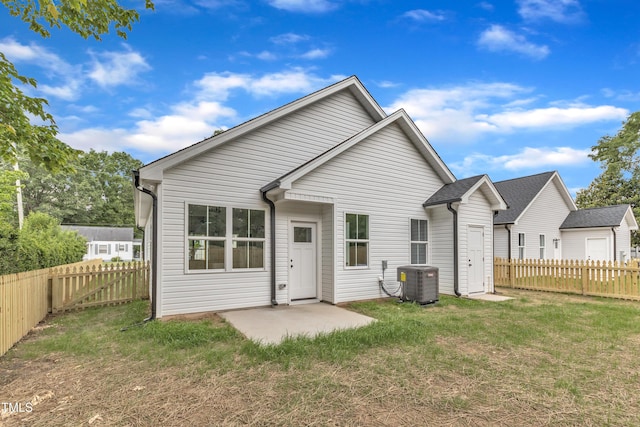 405 N Raiford St, Selma, NC 27576 - rear view of property with central AC unit and a patio area