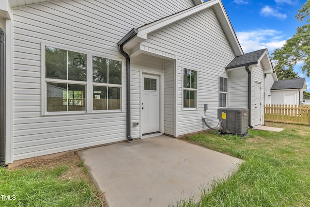 405 N Raiford St, Selma, NC 27576 - back of property featuring cooling unit and a patio