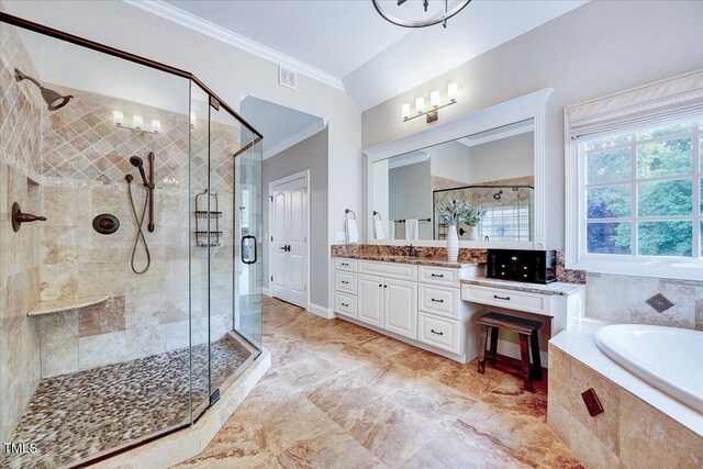 full bath with crown molding, tiled tub, a stall shower, and vanity