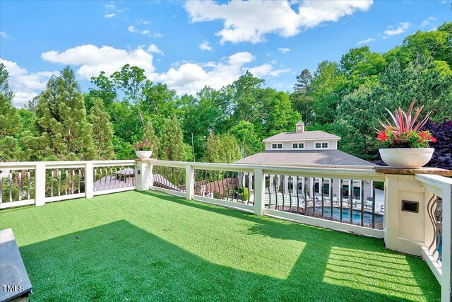 view of yard with an outdoor pool