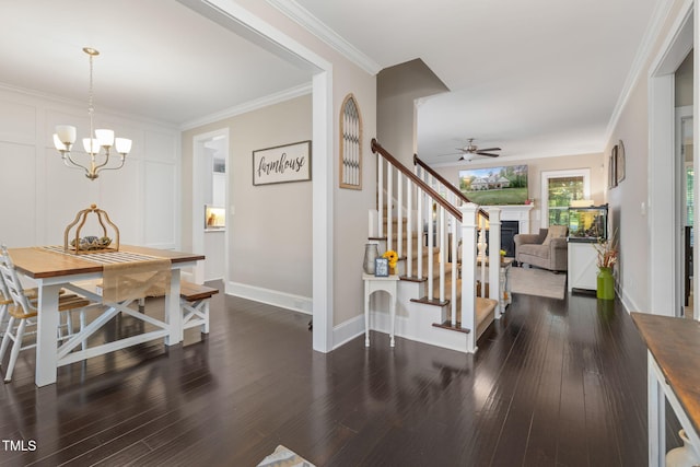 175 Lockamy Ln, Youngsville, NC 27596 - entryway with stairs, ceiling fan, a chandelier, dark wood-type flooring, and crown molding
