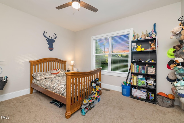 175 Lockamy Ln, Youngsville, NC 27596 - carpeted bedroom with baseboards and ceiling fan